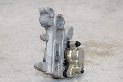 2011 APRILIA DORSODURO 750 OEM REAR BACK BRAKE CALIPER W MOUNT BRACKET