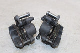 06-08 KAWASAKI NINJA 650R OEM RIGHT LEFT FRONT BRAKE CALIPER SET PAIR CALIPERS