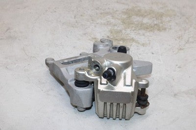 2011 APRILIA DORSODURO 750 OEM REAR BACK BRAKE CALIPER W MOUNT BRACKET