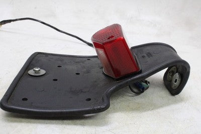 80-83 YAMAHA XT250 OEM REAR BACK TAIL LIGHT W MOUNT BRACKET