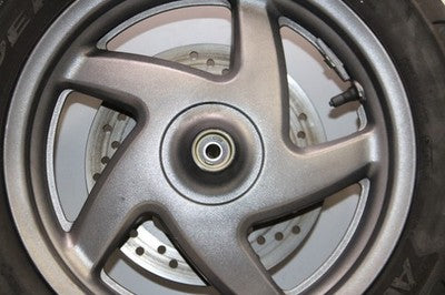 04-07 HONDA REFLEX SPORT 250 NSS250S OEM FRONT WHEEL RIM W TIRE