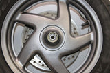 04-07 HONDA REFLEX SPORT 250 NSS250S OEM FRONT WHEEL RIM W TIRE