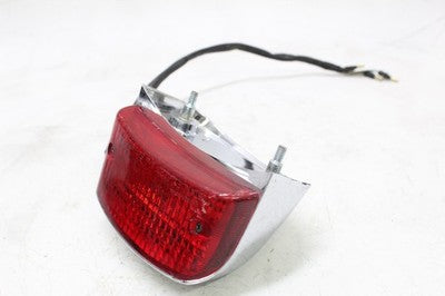 2007 HONDA REBEL 250 CMX250C OEM TAILLIGHT REAR TAIL BRAKE LIGHT W CHROME COVER