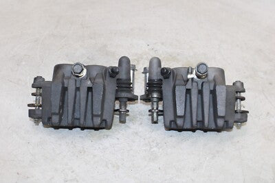 06-08 KAWASAKI NINJA 650R OEM RIGHT LEFT FRONT BRAKE CALIPER SET PAIR CALIPERS