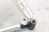 2004 KAWASAKI NINJA 250R EX250F OEM LEFT REARSET DRIVER FOOT PEG BRACKET MOUNT