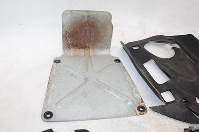 1990 SUZUKI QUADRUNNER 4WD LT4WD OEM MISC PLASTIC COVERS BRACKETS