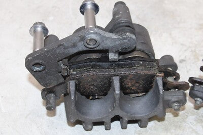 06-08 KAWASAKI NINJA 650R OEM RIGHT LEFT FRONT BRAKE CALIPER SET PAIR CALIPERS