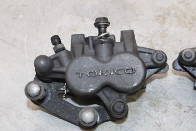 06-08 KAWASAKI NINJA 650R OEM RIGHT LEFT FRONT BRAKE CALIPER SET PAIR CALIPERS