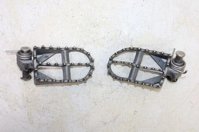 2009 BMW G450X OEM REAR LEFT RIGHT FOOT RESTS PEGS
