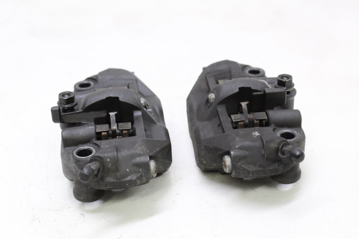 2006 Honda CBR600RR OEM RIGHT LEFT FRONT BRAKE CALIPER SET PAIR CALIPERS