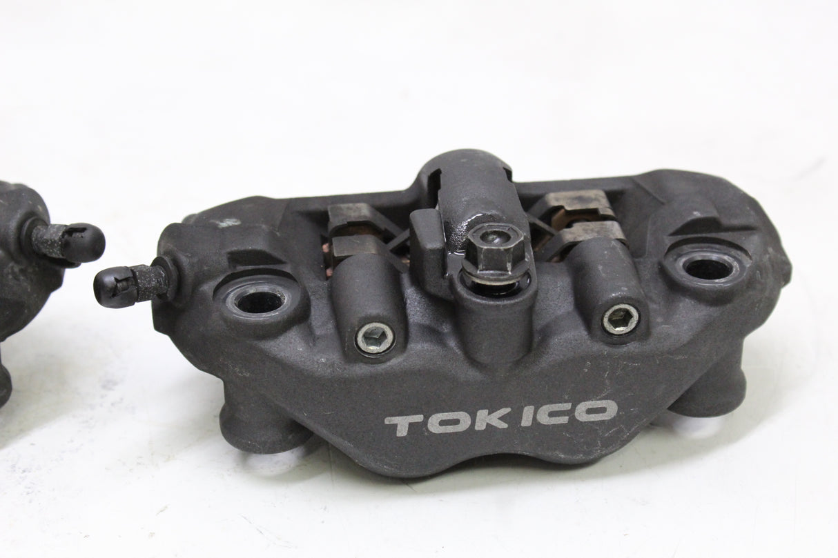 2006 Honda CBR600RR OEM RIGHT LEFT FRONT BRAKE CALIPER SET PAIR CALIPERS