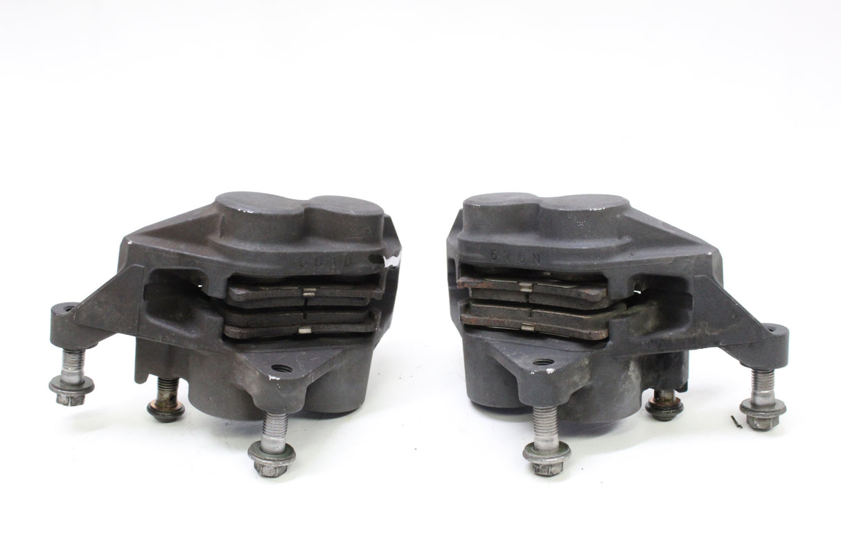 2007 Yamaha YZF R6S OEM RIGHT LEFT FRONT BRAKE CALIPER SET PAIR CALIPERS