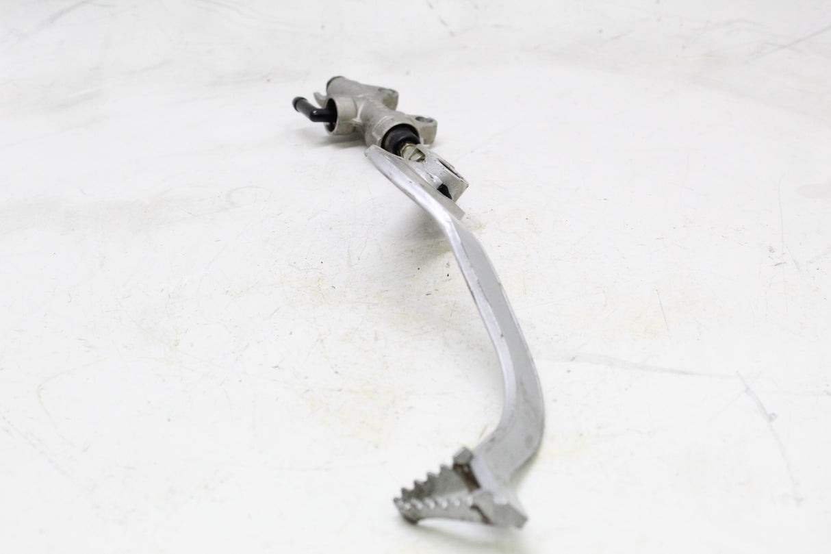 2011 KAWASAKI KLR650 OEM REAR BRAKE PEDAL W MASTER CYLINDER