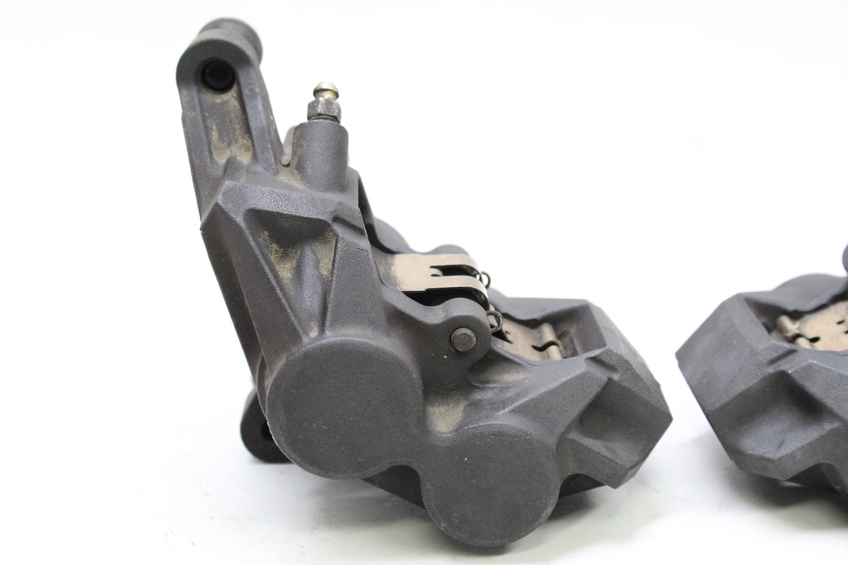 2007 Yamaha YZF R6S OEM RIGHT LEFT FRONT BRAKE CALIPER SET PAIR CALIPERS
