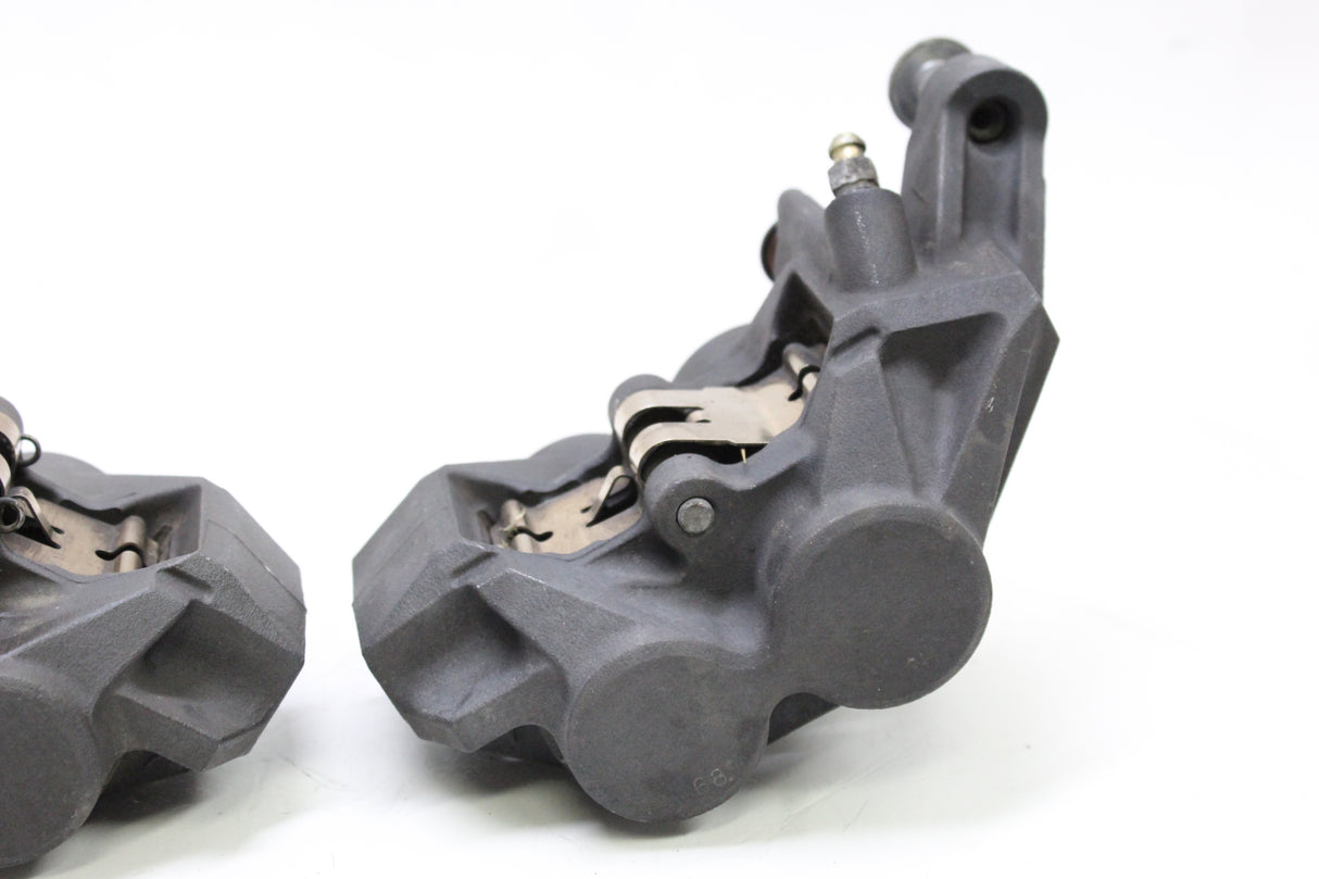 2007 Yamaha YZF R6S OEM RIGHT LEFT FRONT BRAKE CALIPER SET PAIR CALIPERS