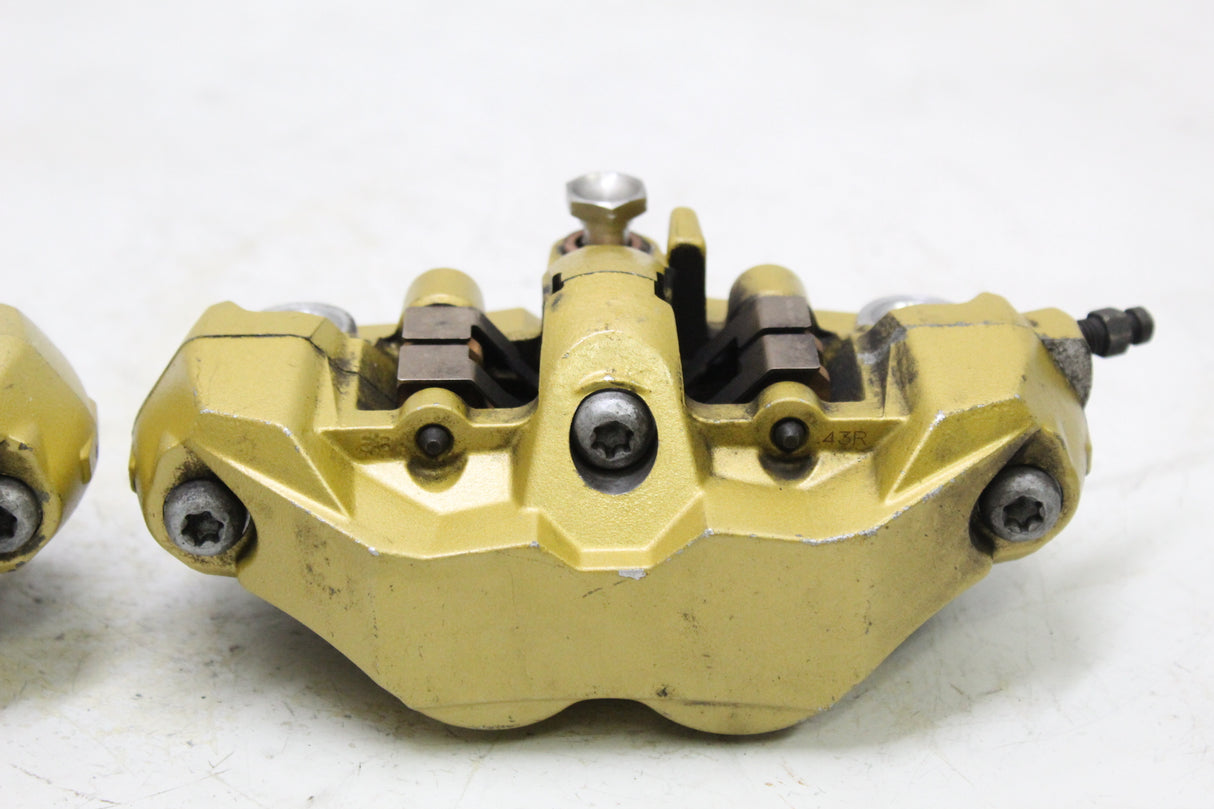 2004 SUZUKI GSXR600 OEM TOKICO FRONT BRAKE CALIPER SET PAIR
