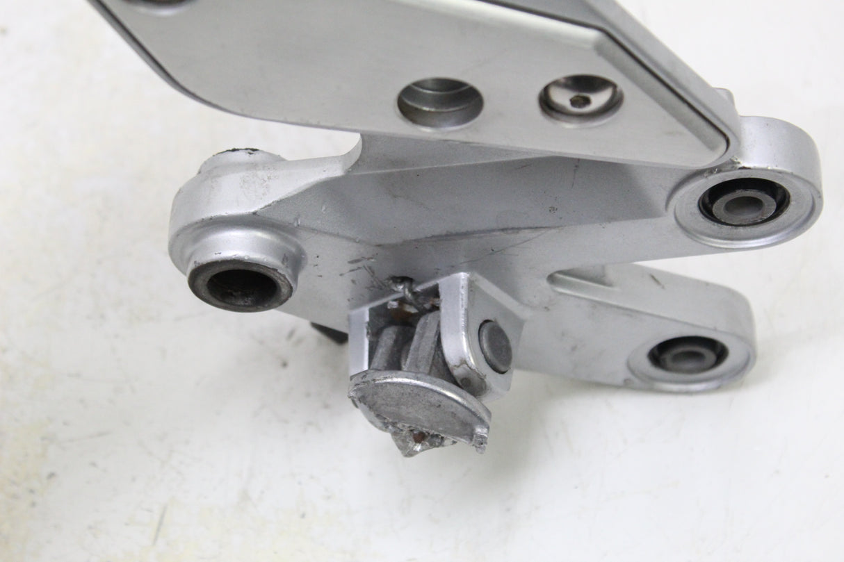 2005 YAMAHA FZ6 OEM RIGHT REARSET FOOTREST MOUNT BRACKET HEEL GUARD