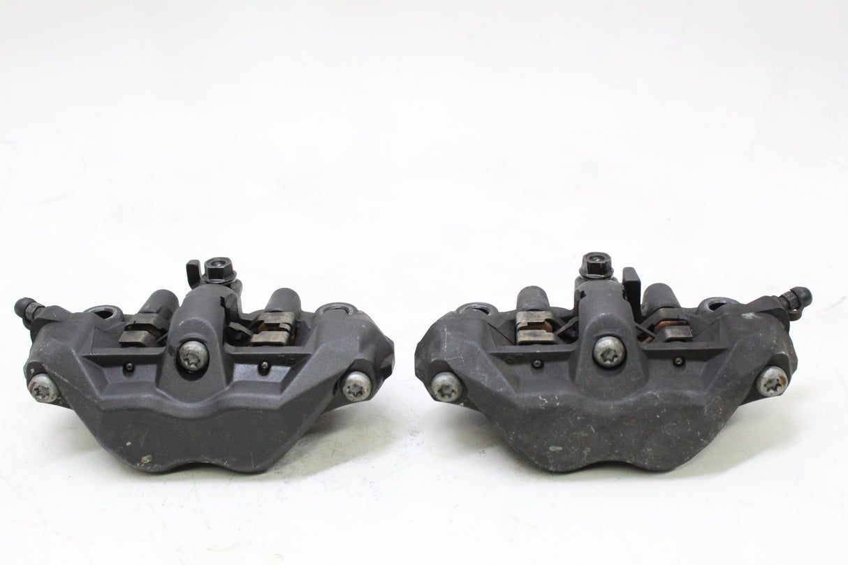2006 Honda CBR600RR OEM RIGHT LEFT FRONT BRAKE CALIPER SET PAIR CALIPERS